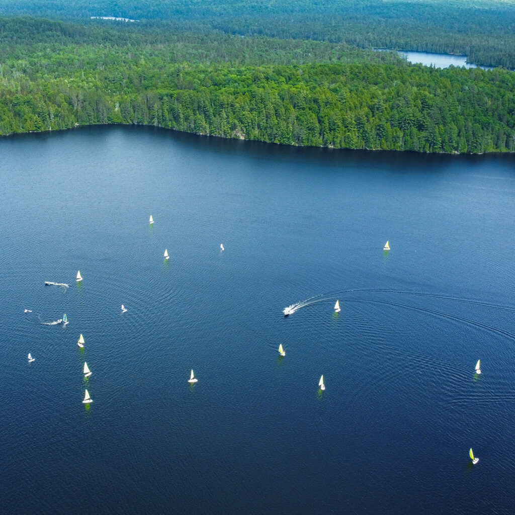 aerial shot of sailboats at camp arowhon