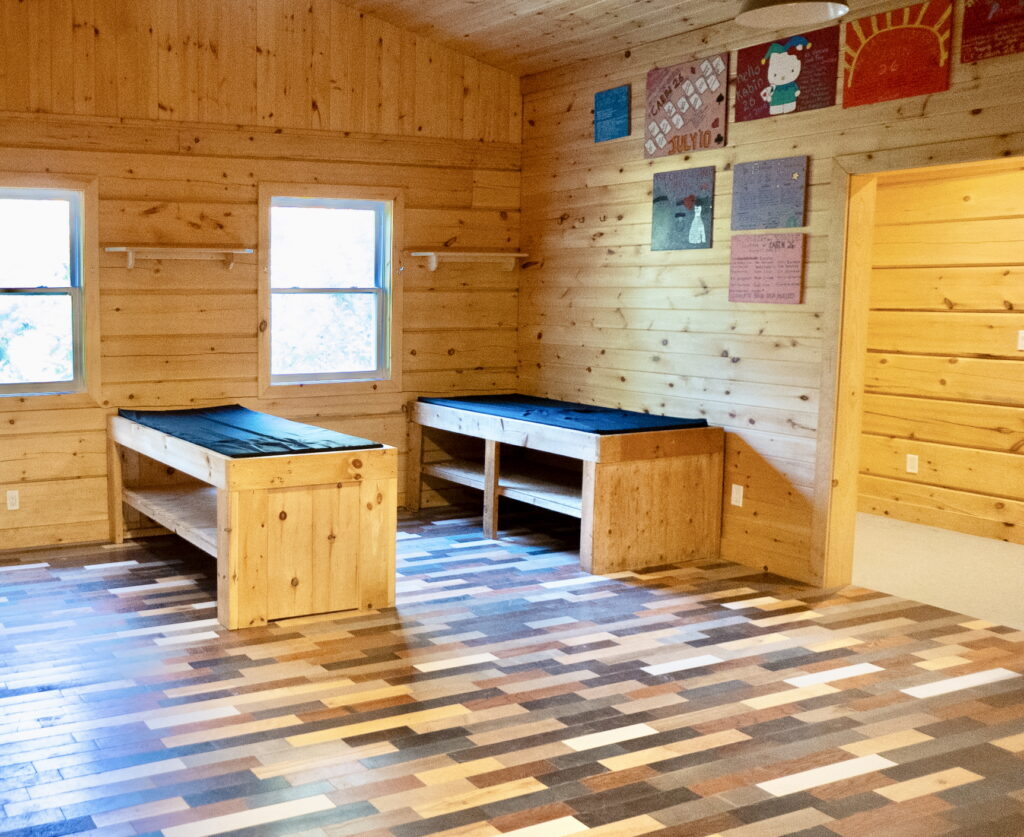 inside a camper cabin counsellor bed